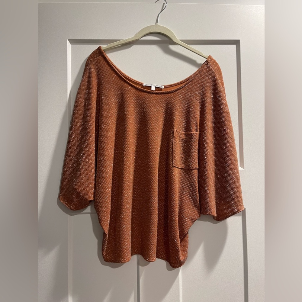 Large sparkly orange Collective Concepts top.